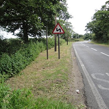Allotment bus shelter and village sign